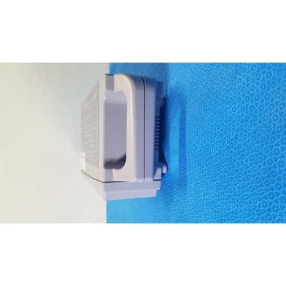 Gray plastic wall-mounted Nellcor Puritan Bennett OxiMax N-560 pulse oximeter SPO2 patient monitor with ventilation slots