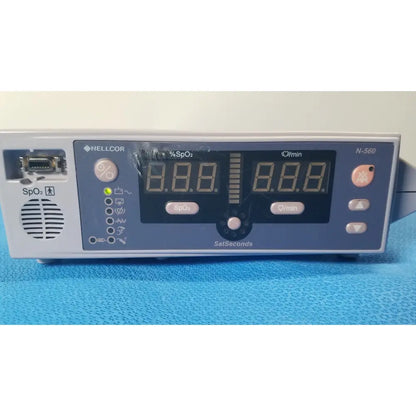 Nellcor puritan bennett puritan bennett oximax n-560 pulse oximeter spo2 monitor with gray and blue front panel display
