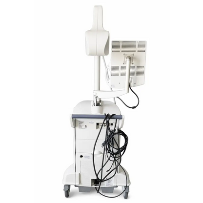 White neuronetics neurostar tms therapy system with monitor probe arm and wheeled cart for patient use