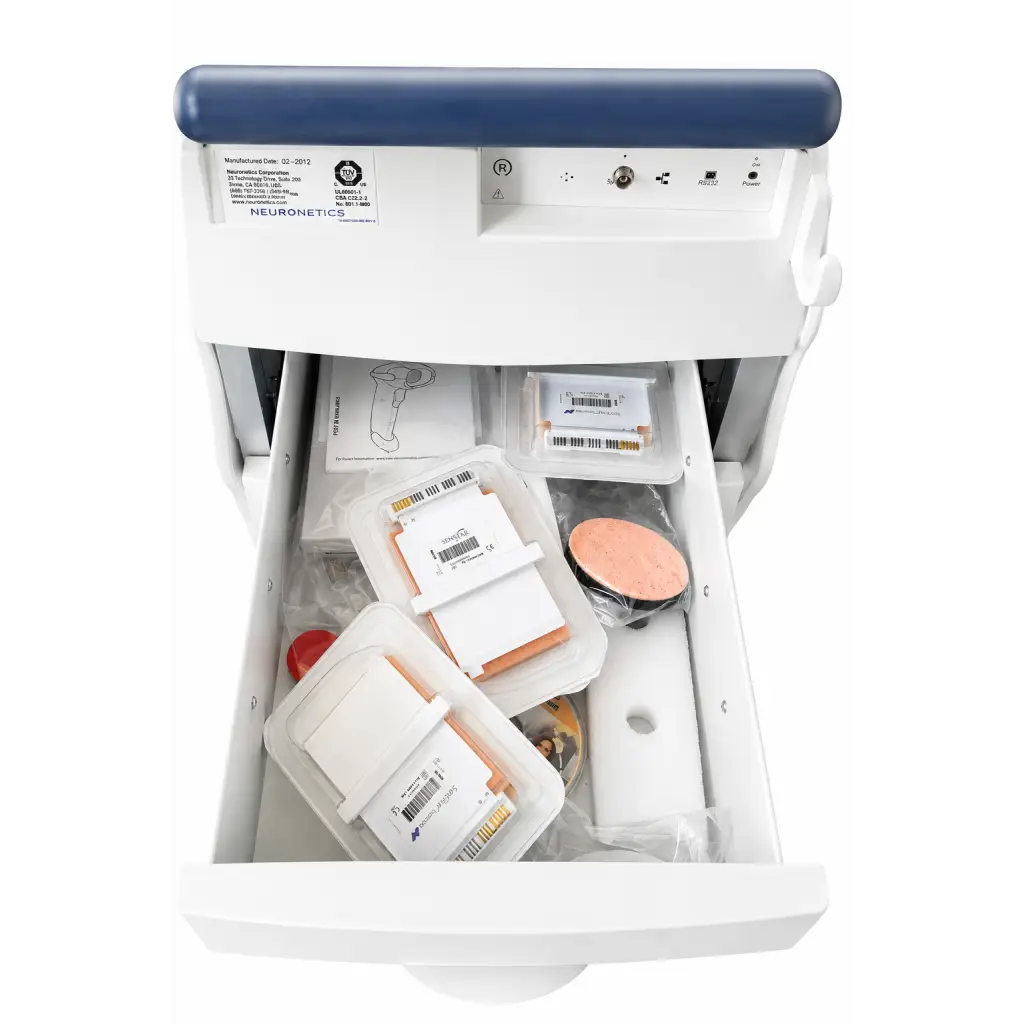 White and blue neuronetics neurostar advanced tms therapy system with open drawer showing packaged components