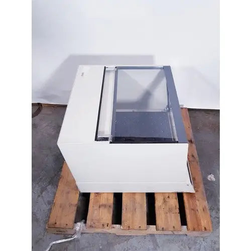White rectangular industrial machine with transparent glass panel and metallic frame brunswick scientific classic c24