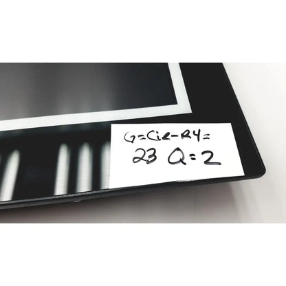 Black rectangular nexcom ippd2100p multimedia panel pc with white label showing handwritten math equations and numbers