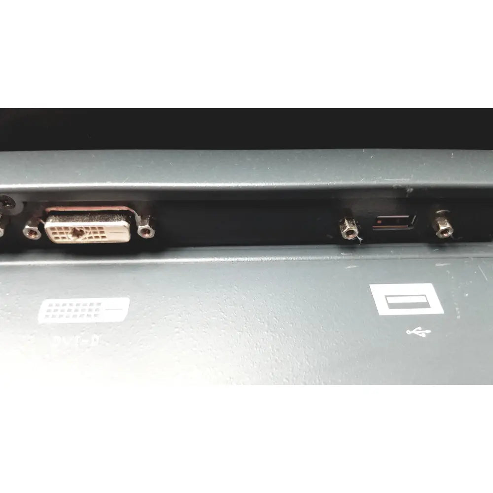 Backside of nexcom ippd2100p multimedia panel pc showing a metallic dvi-d port and screws on dark gray casing