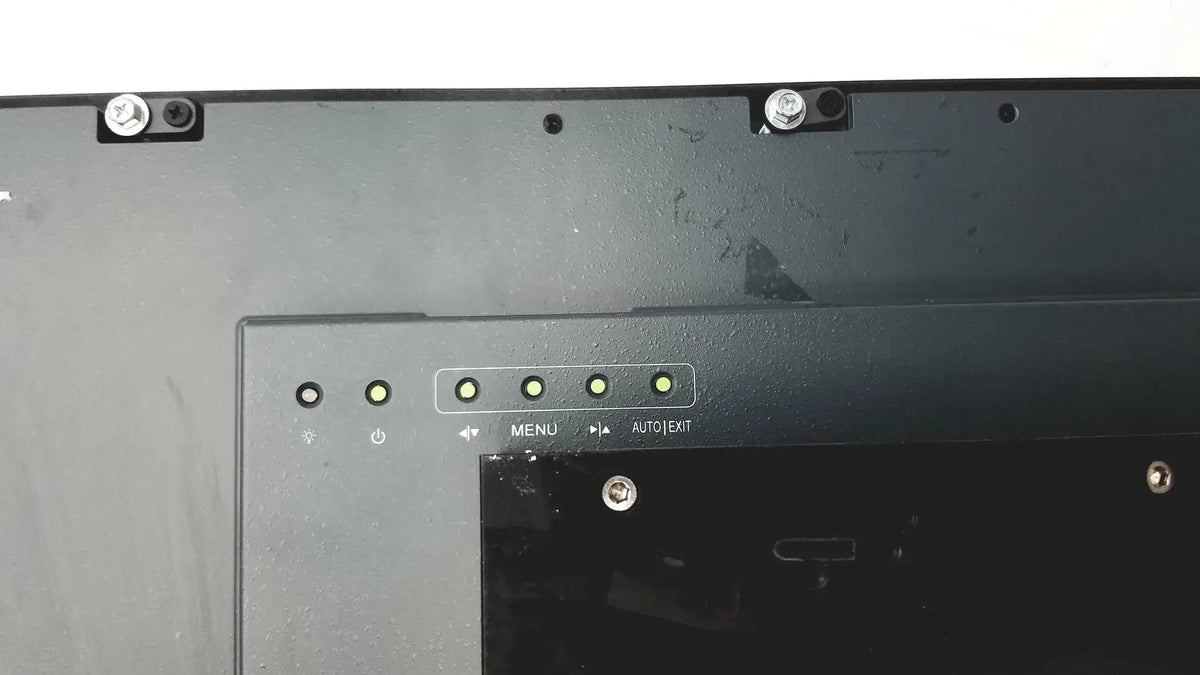 Black plastic back panel of nexcom ippd2100p multimedia panel pc with five illuminated green indicator lights and labeled buttons