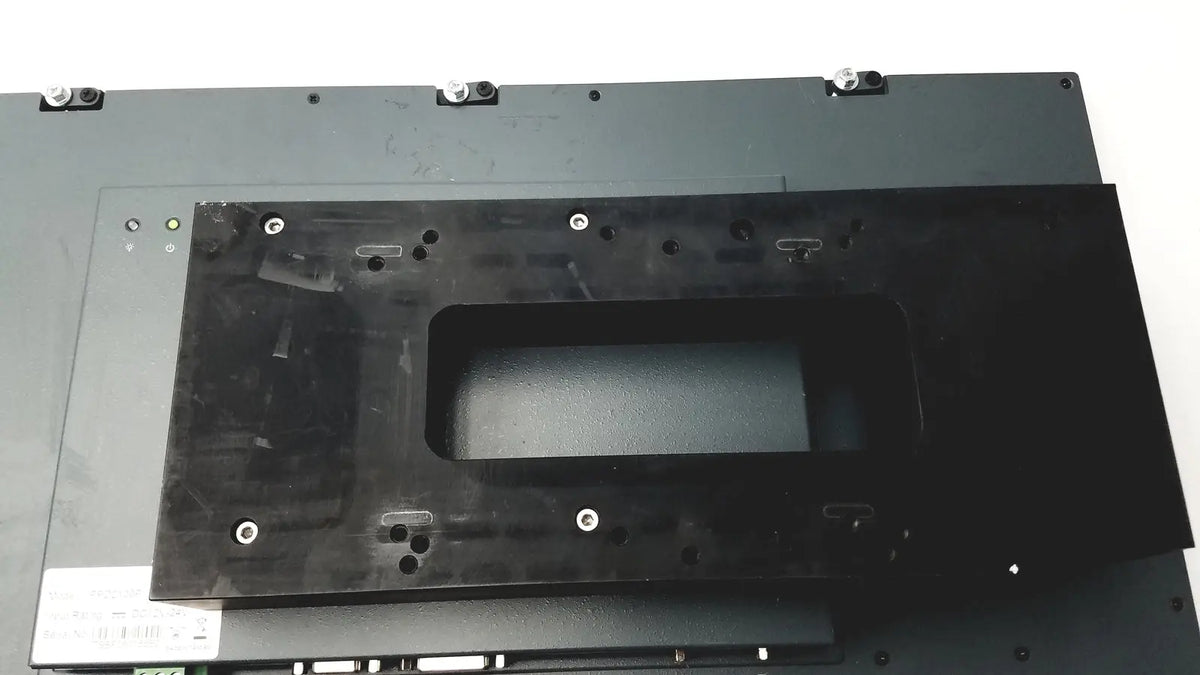 Black plastic laptop base plate with rectangular cutout and screw holes for nexcom ippd2100p multimedia panel pc back side