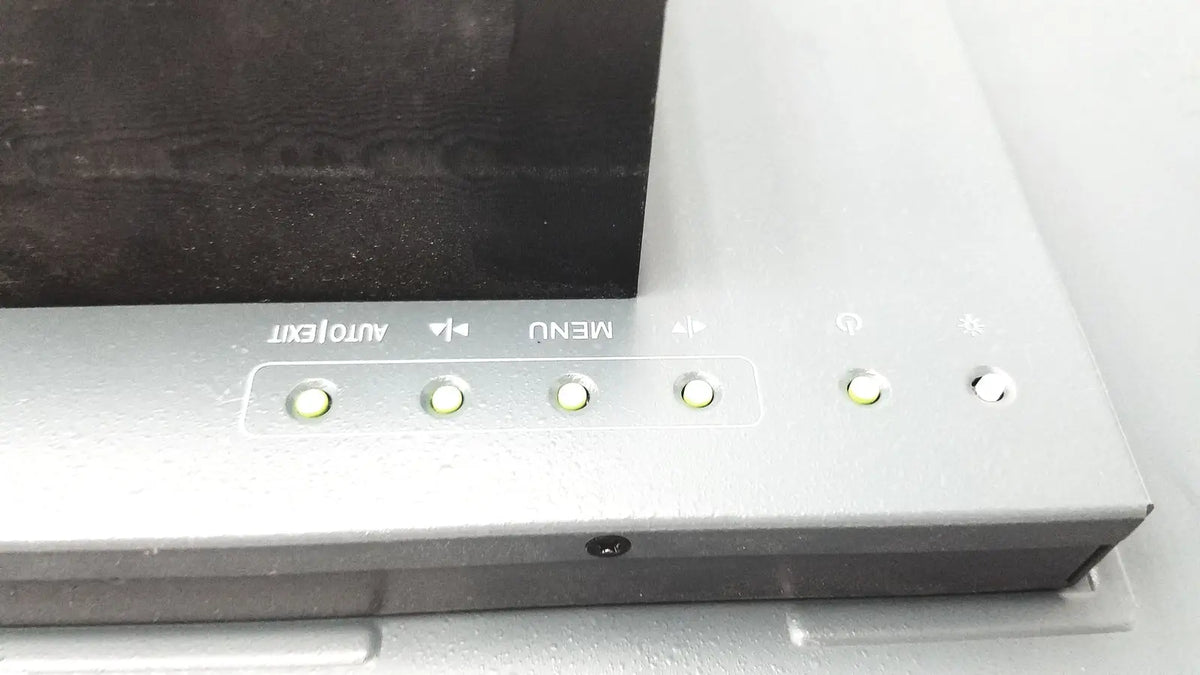 Silver-framed nexcom ippd2100p multimedia panel pc featuring auto text and menu buttons with illuminated indicator lights