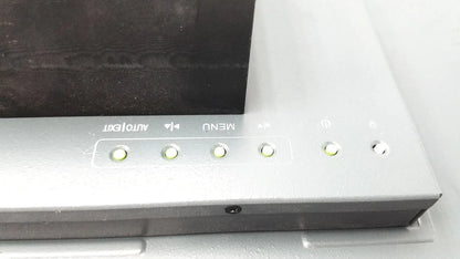 Silver-framed nexcom ippd2100p multimedia panel pc featuring auto text and menu buttons with illuminated indicator lights