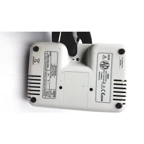White plastic rear panel of nicolet vascular imex freedop ultrasound doppler with black ventilation slits and labels
