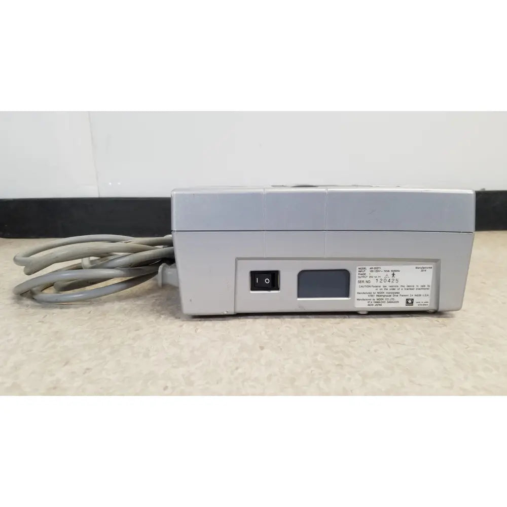 Gray plastic power strip with coiled cords and black switch for nidek ar-20st1 handheld autorefractor printer use