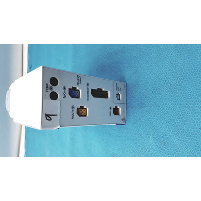 White rectangular nihon kohden ay-651p multi-parameter module with multiple ports and labeled connectors on back side
