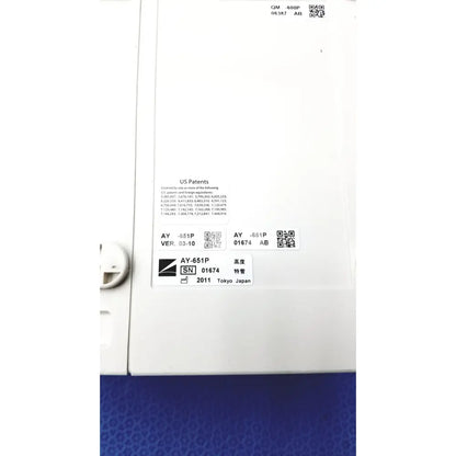 White plastic label with black text and qr codes on the back of nihon kohden ay-651p multi-parameter module