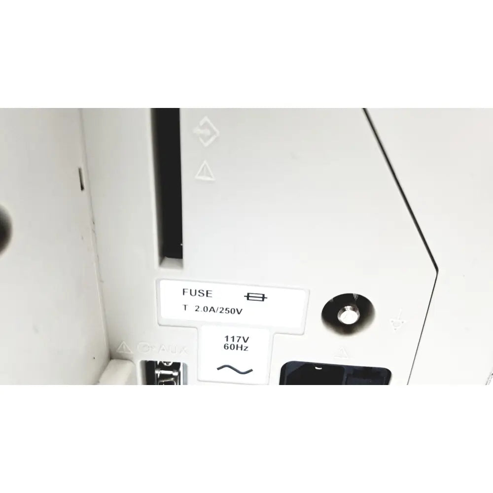 White plastic fuse holder labeled fuse t 2.0a 250v with 117v 60hz specs on the back of nihon kohden bsm-2351a bedside patient monitor