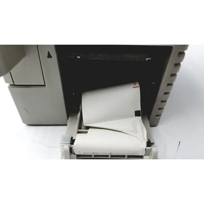 Beige thermal printer with white paper roll output from nihon kohden bsm-2351a bedside patient monitor