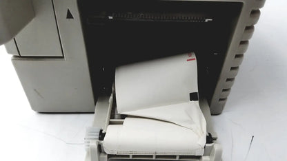 Beige thermal printer with white paper roll output from nihon kohden bsm-2351a bedside patient monitor