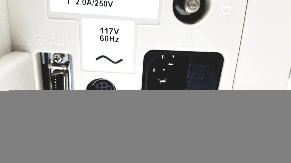 White rear panel of nihon kohden bsm-2351a bedside patient monitor with labeled power specs and multiple input ports