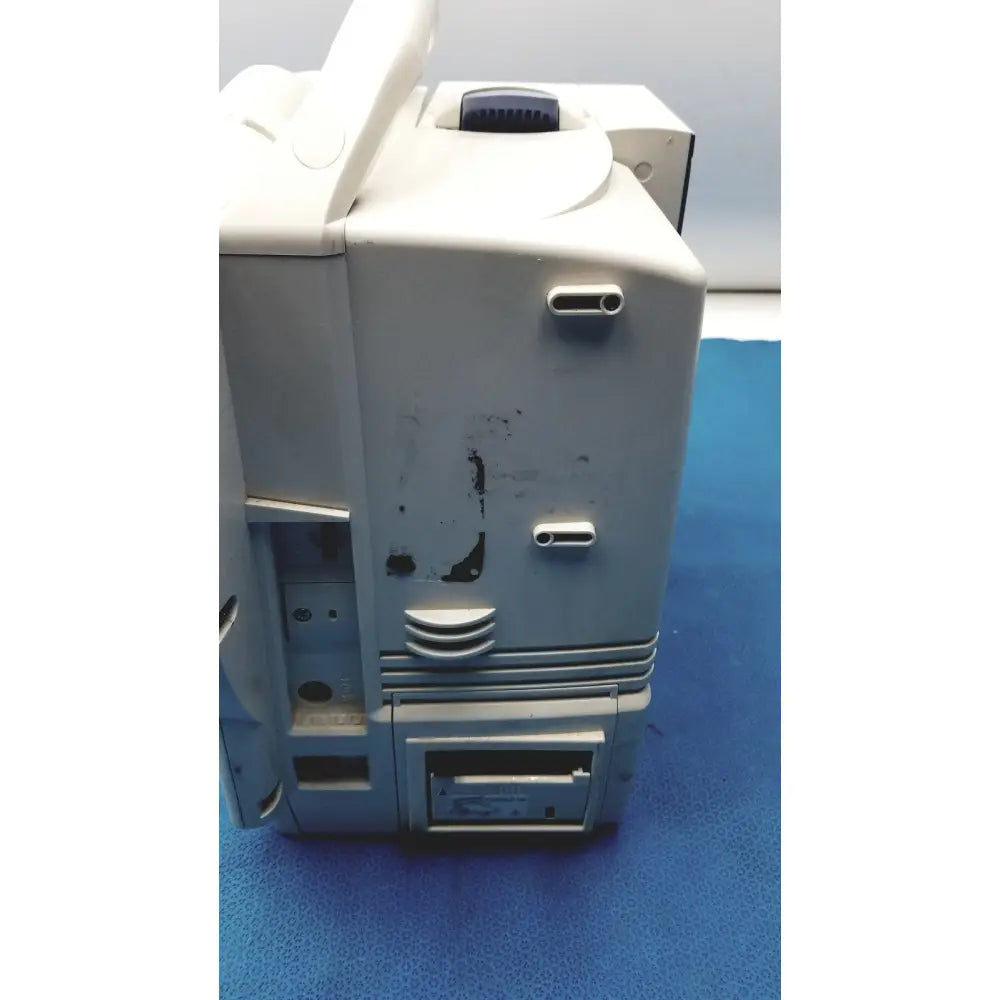 Nihon kohden BSM-6501A life scope bedside patient monitor in beige with handle and ventilation slots on its side