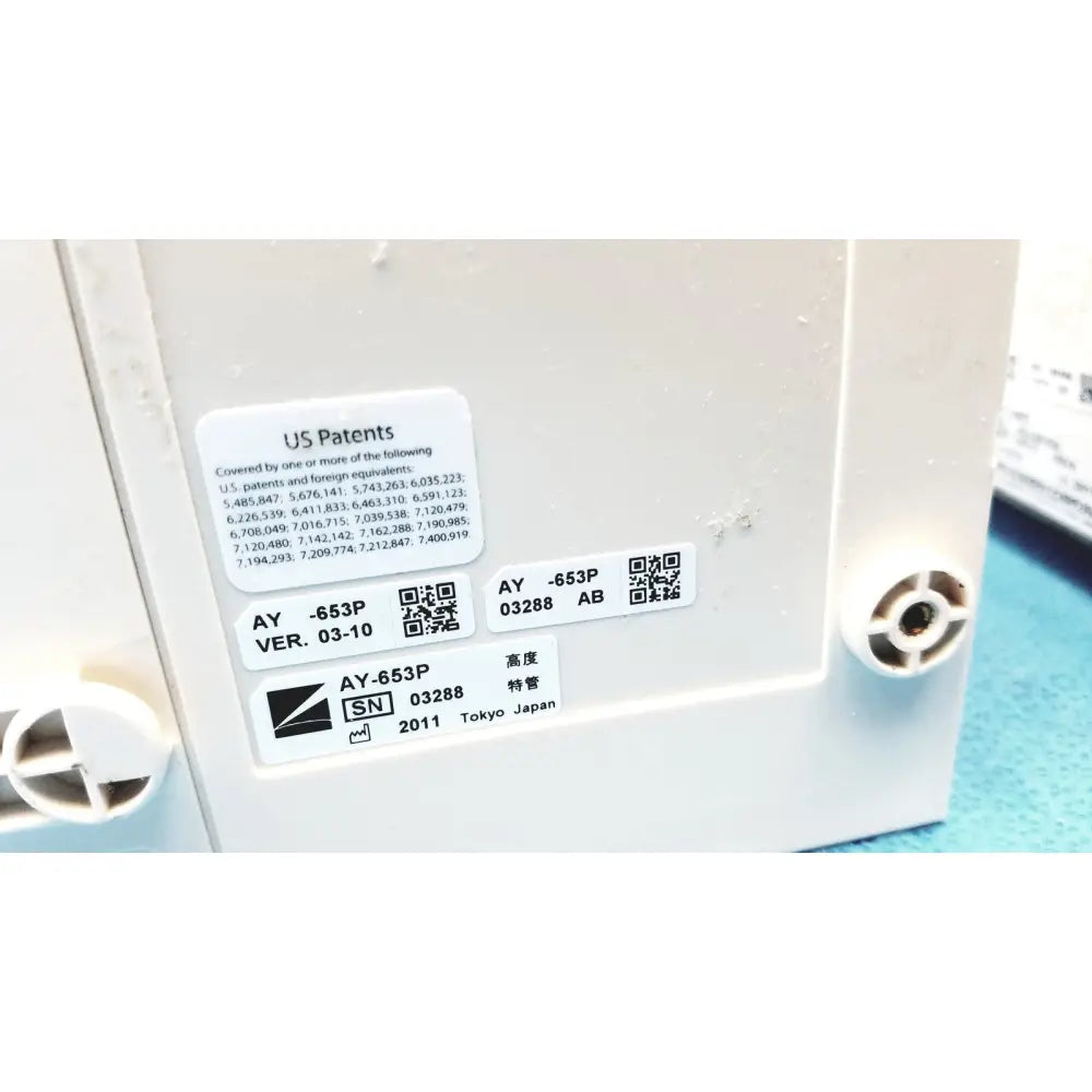 White plastic back side of nihon kohden bsm-6501a life scope bedside patient monitor with circular port and labels