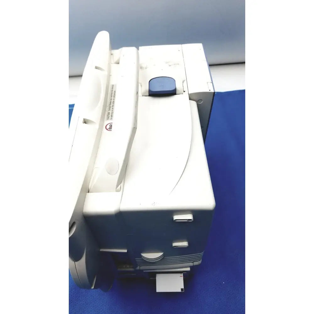 White and gray fujitsu scanner with a blue control panel button for nihon kohden bsm-6701a life scope bedside monitor