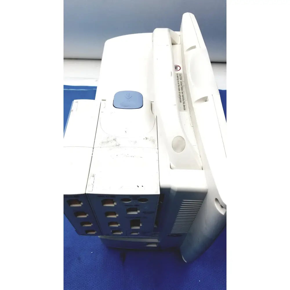 Nihon kohden bsm-6701a life scope bedside patient monitor in white and blue with slightly worn plastic casing