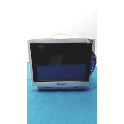 Nihon kohden bsm-6701a life scope bedside patient monitor with gray casing, blue screen, and control buttons on the right side