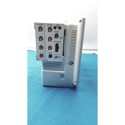Gray plastic industrial control panel with multiple ports and ventilation slots on the back of nihon kohden lifescope bedside patient monitor