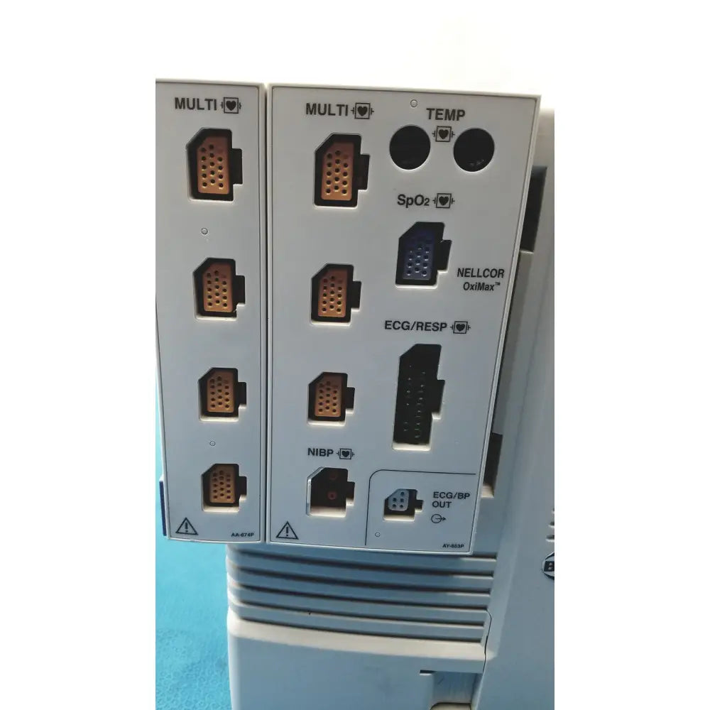 White back panel of nihon kohden lifescope bedside patient monitor with multiple medical ports and connectors