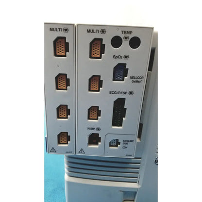 White back panel of nihon kohden lifescope bedside patient monitor with multiple medical ports and connectors
