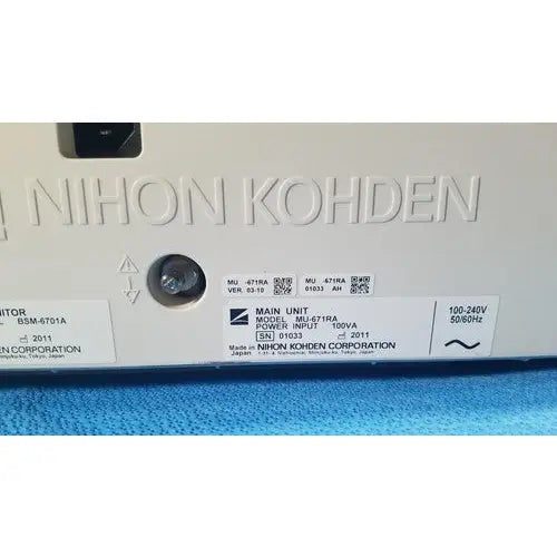White plastic nihon kohden life scope bedside patient monitor main unit with engraved brand name and specifications label