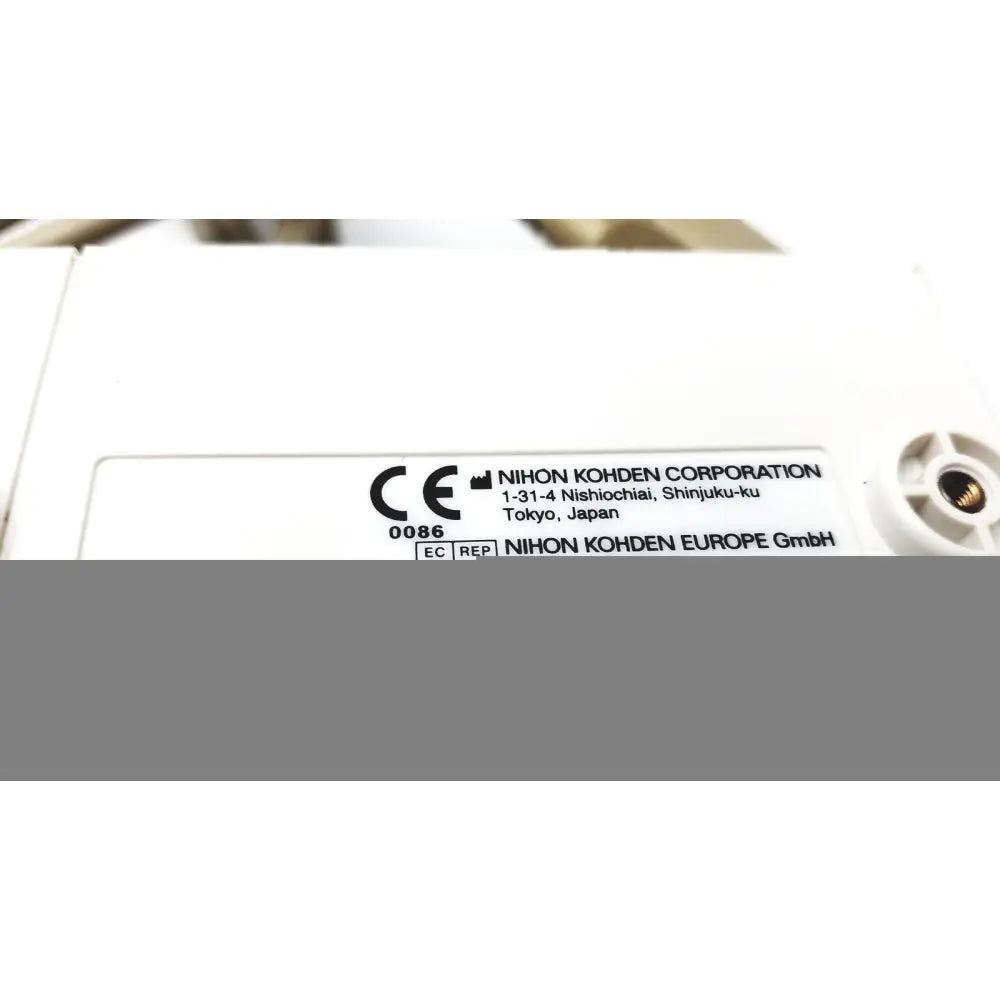 White plastic label with black text and CE marking on the back of Nihon Kohden Life Scope BSM-6301A bedside patient monitor