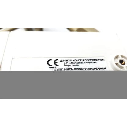 White plastic label with black text and CE marking on the back of Nihon Kohden Life Scope BSM-6301A bedside patient monitor