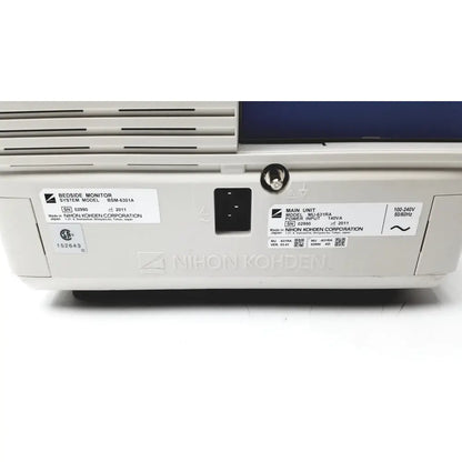 White plastic back panel of nihon kohden life scope bsm-6301a bedside patient monitor with black power port and silver screw