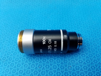Black and silver Nikon 100x oil immersion microscope objective lens with gold thread and 1.25 numerical aperture compatible Nikon microscope