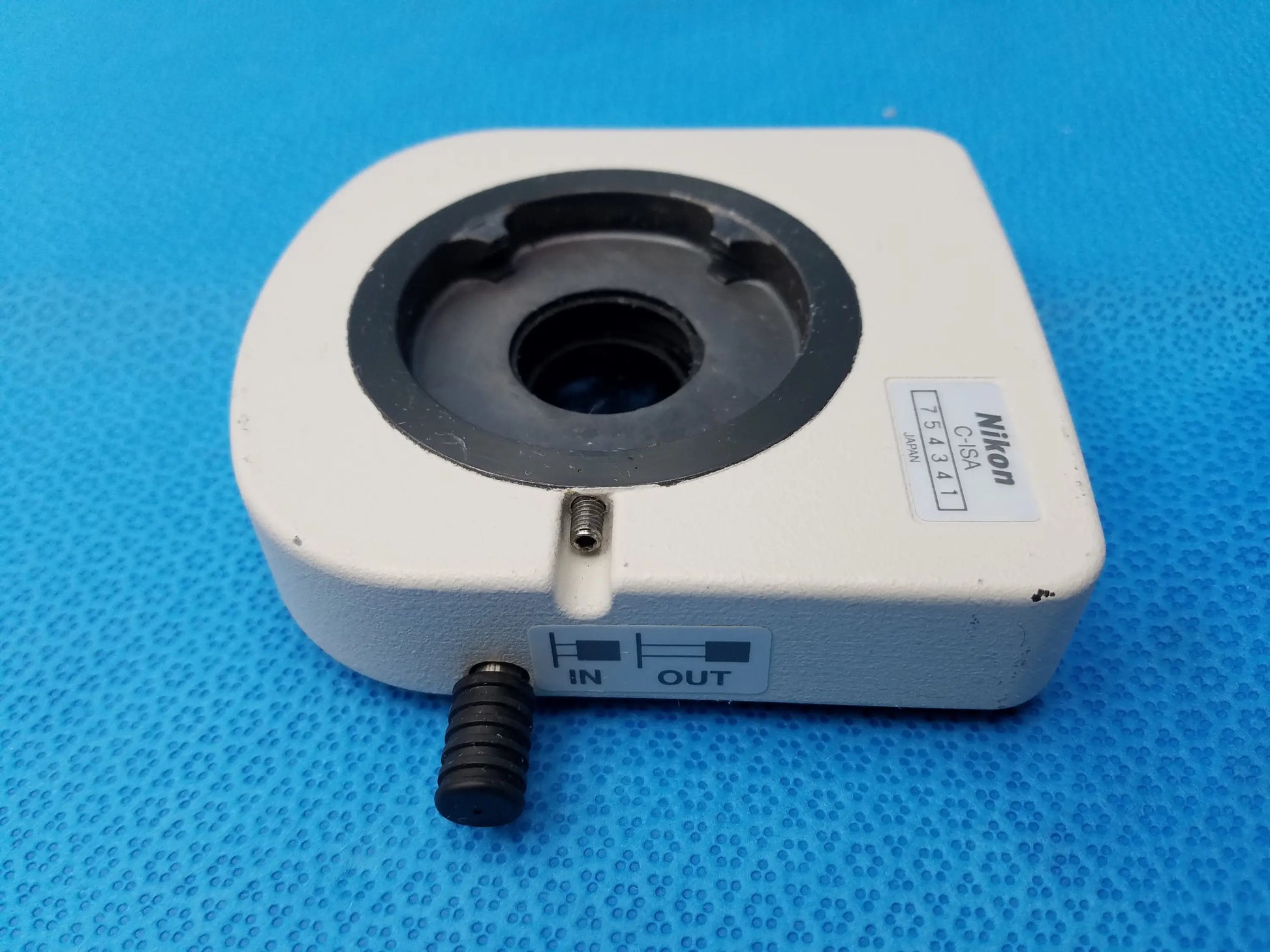 White nikon c-15a intermediate tube with simple analyzer featuring a precision optical lens mount and black rubberized interior