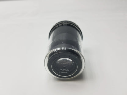 Black Nikon CFI 15x 14.5 microscope eyepiece with clear protective cap marked Japan and Fujinon and storage case compatible Nikon microscope systems