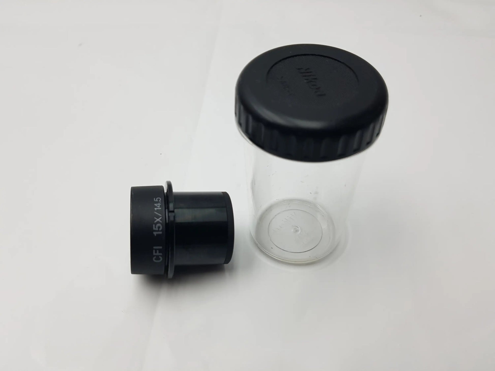 Black nikon cfi 15x 0.5 microscope eyepiece with storage case compatible with nikon microscope systems