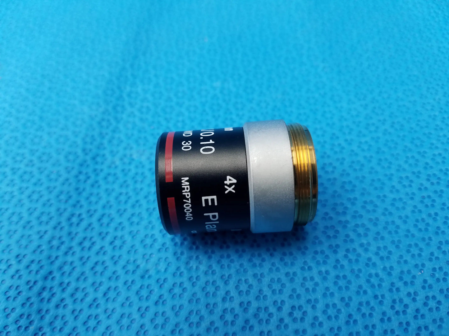 Nikon e plan black and silver 4x microscope objective with gold threaded mount and 0.10 numerical aperture