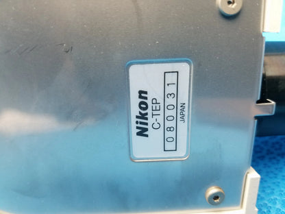 Nikon microscope c-tep camera adapter with silver metallic finish and white label showing model number 080031