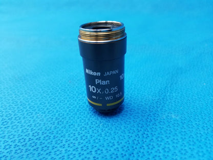 Nikon plan 10x microscope objective lens with black body and gold threaded mount compatible with Nikon microscope systems