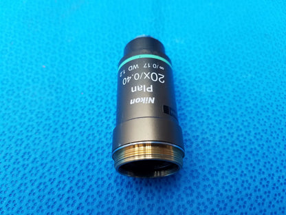 Nikon plan 20x 0.40 microscope objective lens with black body and gold threaded mount for precise microscopy use
