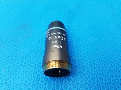 Nikon plan 40x 0.65 microscope objective with black body and gold threaded mount for compatible nikon microscope systems
