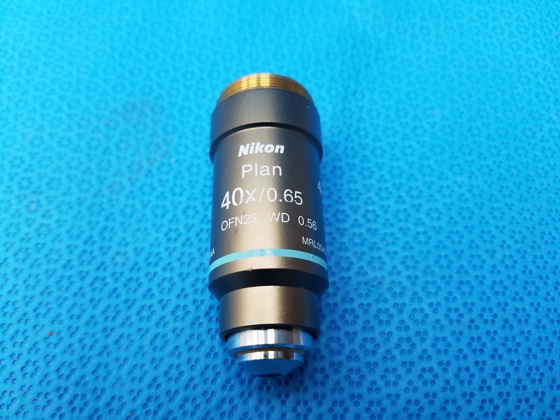 Nikon plan 40x 0.65 black microscope objective lens with gold threaded top engraved for compatible nikon microscope systems