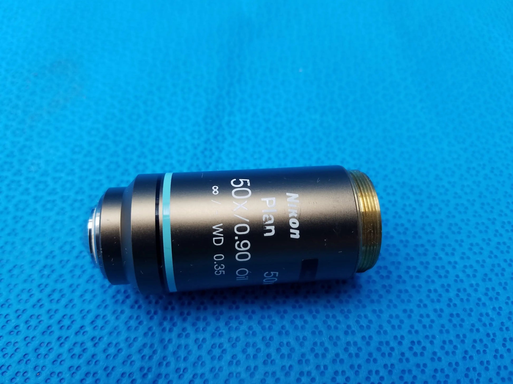 Nikon plan 50x oil immersion microscope objective with black body and gold threaded mount compatible Nikon model