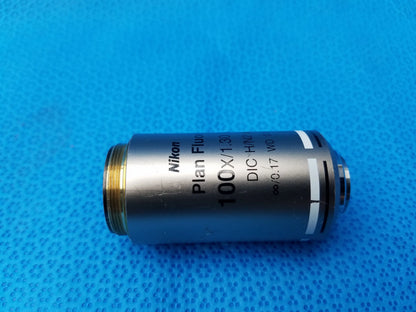 Nikon plan fluor 100x/1.30 microscope objective lens with metallic silver body and black printed specifications compatible Nikon