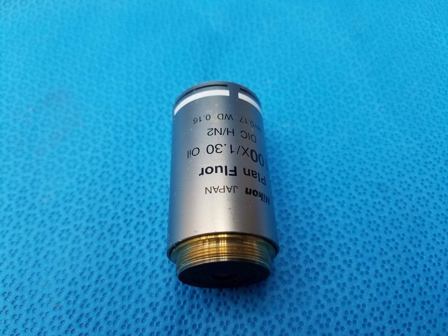 Nikon plan fluor microscope objective with silver metallic body and gold threaded base compatible Nikon Japan model