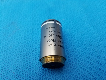 Nikon plan fluor microscope objective with silver metallic body and gold threaded base compatible Nikon Japan model