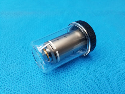 Nikon plan fluor 100x metallic microscope objective with black cap in clear casing compatible Nikon MRH01902