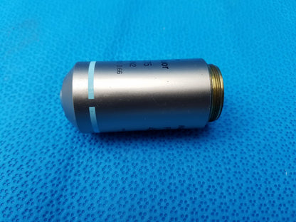 Silver metallic plan fluor microscope objective lens with gold threaded end and light blue markings compatible Nikon