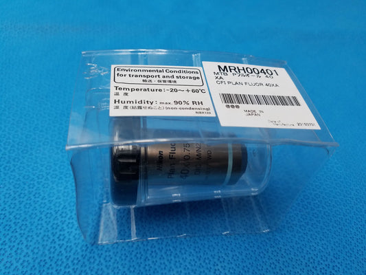 Black and silver plan fluor microscope objective compatible Nikon in clear plastic labeled cfi plan fluor 40xa mrh00401