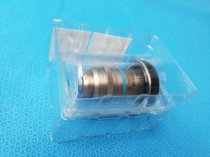 Silver and black optical filter with textured grip ring labeled ovo 95 for nikon plan fluor microscope objective