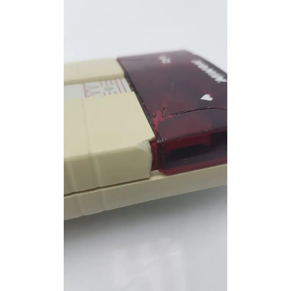 Beige and translucent red plastic cartridge of nonin spo2 handheld pulse oximeter model 8500m with visible label